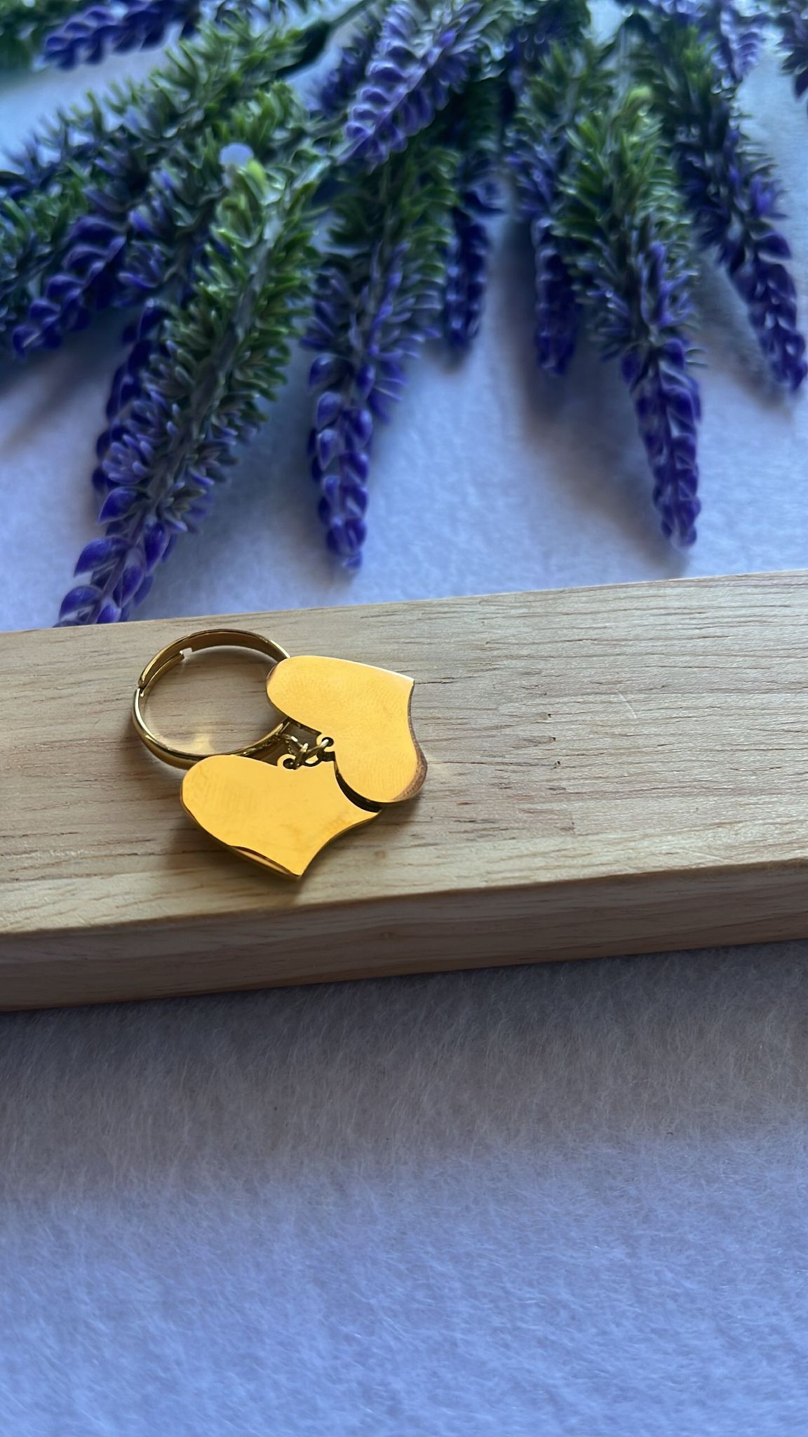 Anello due cuori pendenti